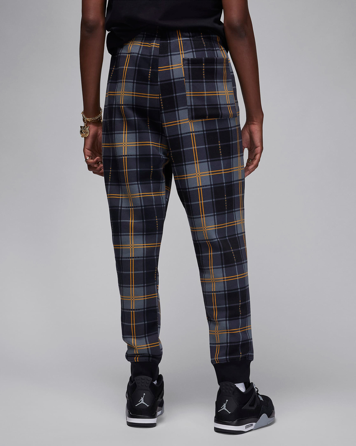 Jordan-Essentials-Holiday-2023-Plaid-Fleece-Pants-Black-Gold-2
