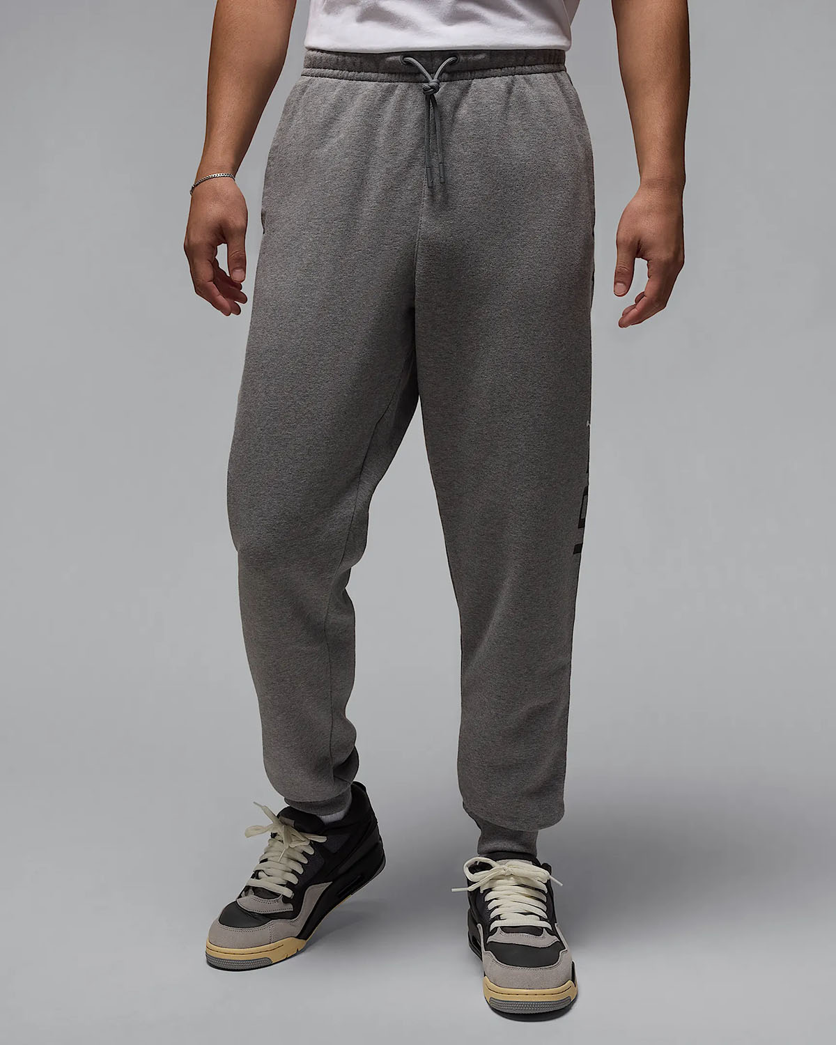Jordan-Essentials-Stretch-Fleece-Mens-Jogger-Pants-Carbon-Heather-Grey-Black-1