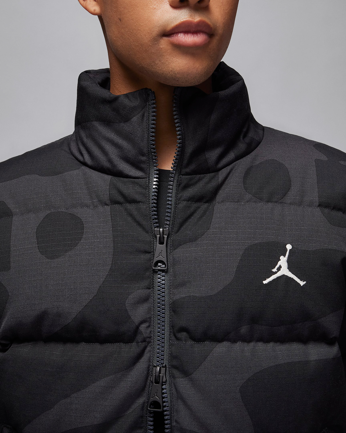 Jordan Flight Heritage Down Jacket in Off Noir Available Now