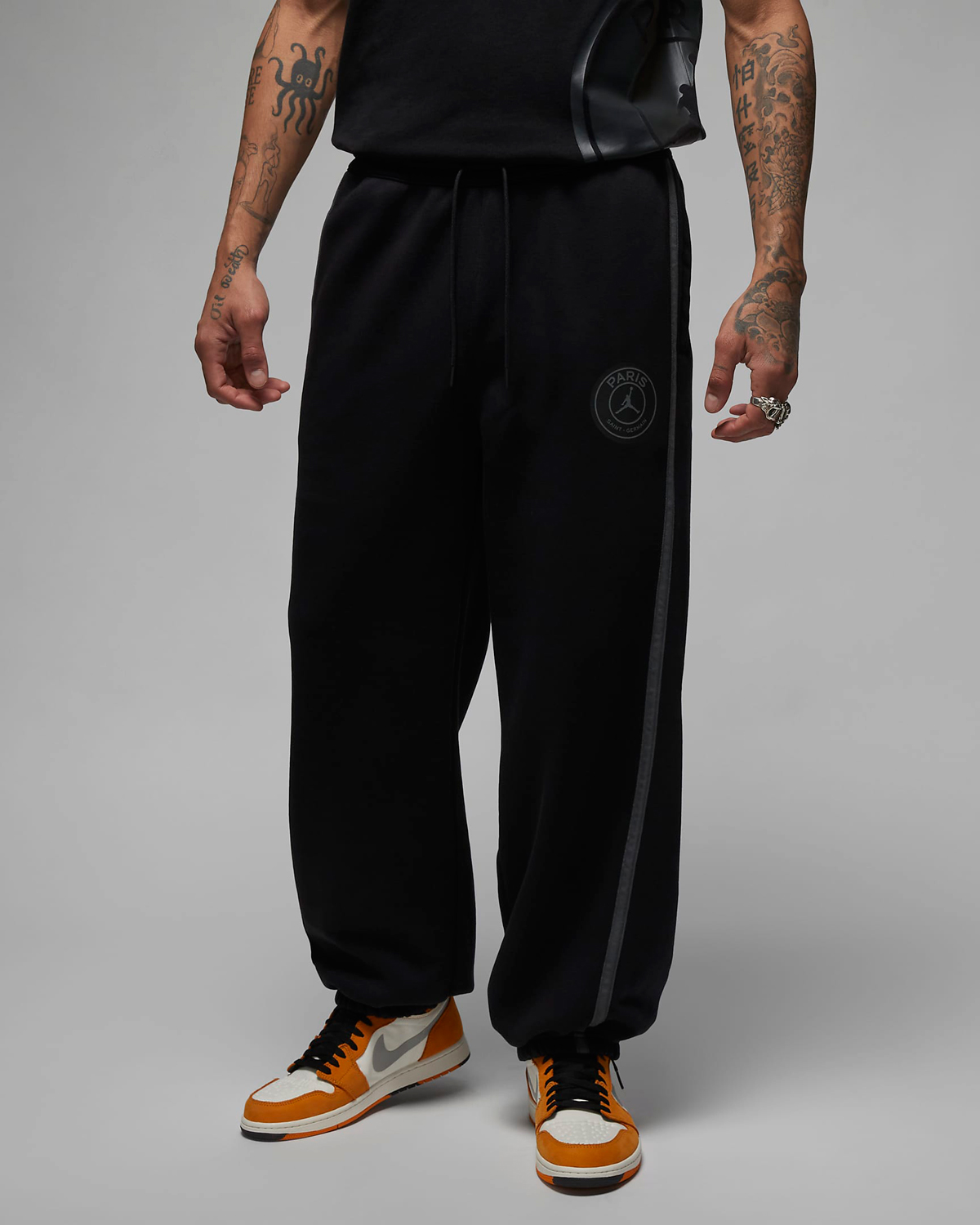 Jordan-PSG-Paris-Saint-Germain-Fleece-Pants-Black-Orange-1
