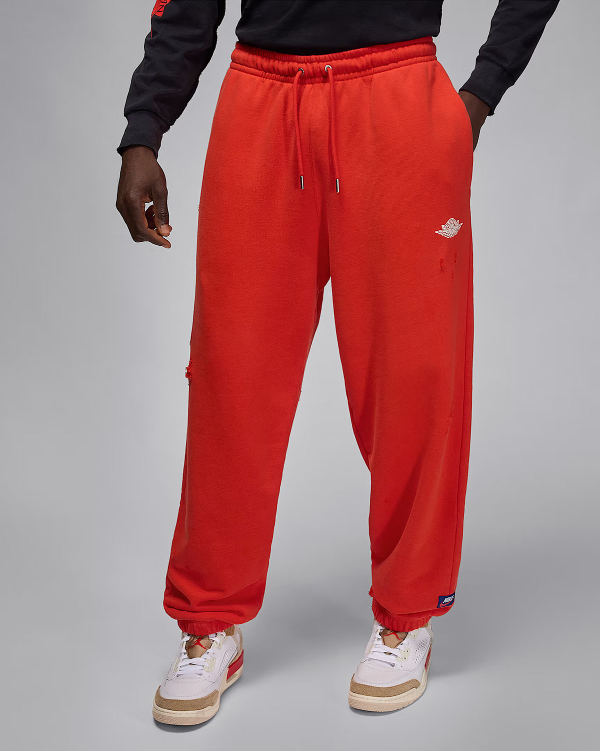 Jordan Rare Air Mens Fleece Pants Chili Red 1