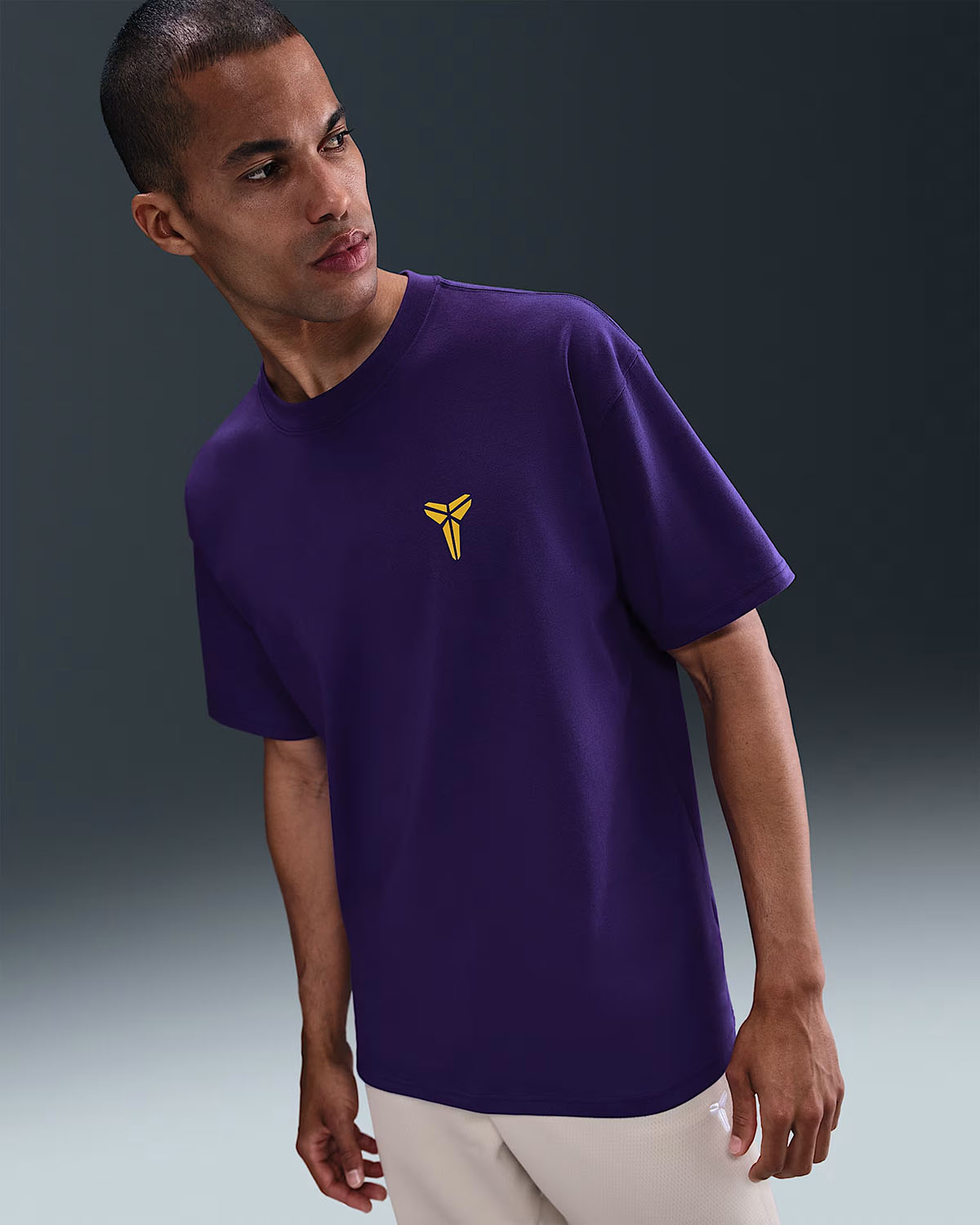 purple and gold nike shirt