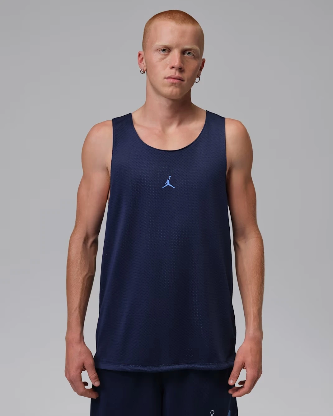 Jordan Sport Reversible Jersey in Midnight Navy with University Blue Jumpman matching the Air Jordan 13 "Flint" (2026).