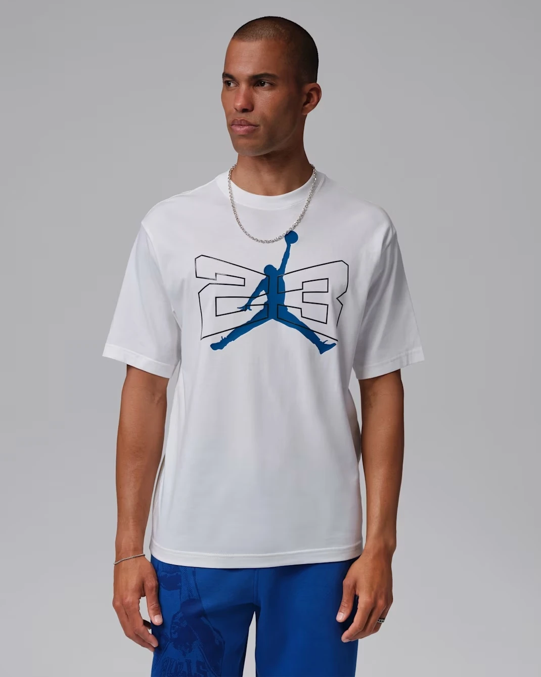 White Jordan 85 graphic T-shirt with blue Jumpman graphic styled for the Air Jordan 3 True Blue.