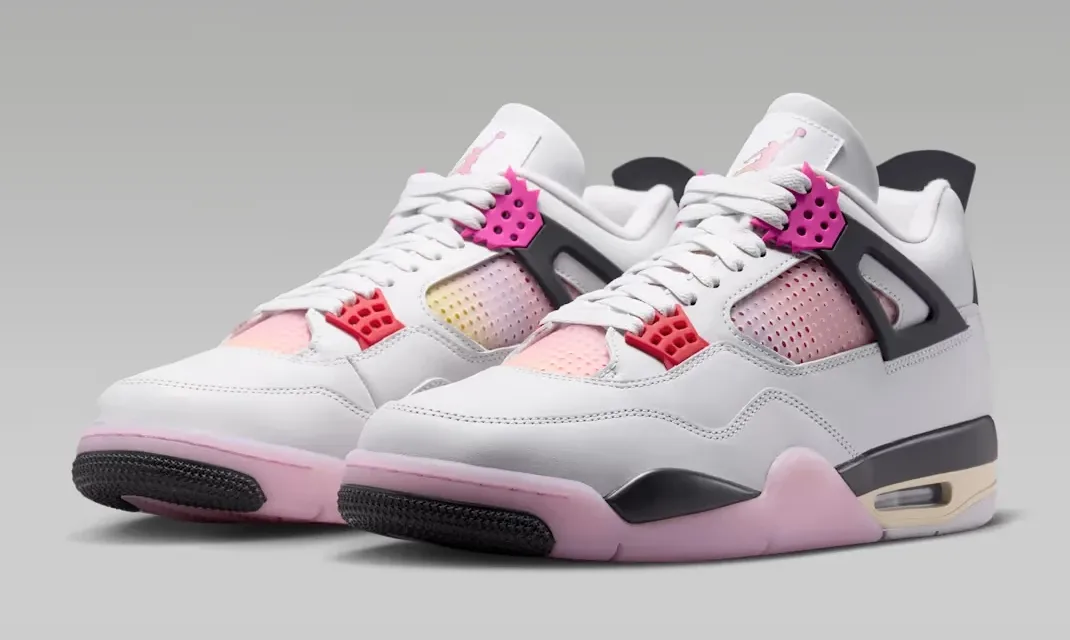 Angled front view of the Air Jordan 4 Comic pair featuring gradient comic-inspired details and pink outsole.
