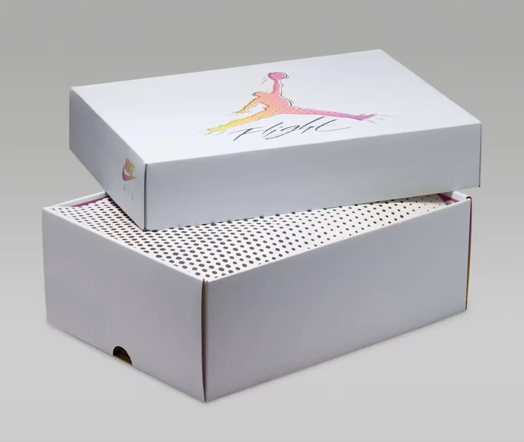 Special edition Air Jordan 4 Comic shoe box featuring gradient Jumpman artwork and custom packaging.
