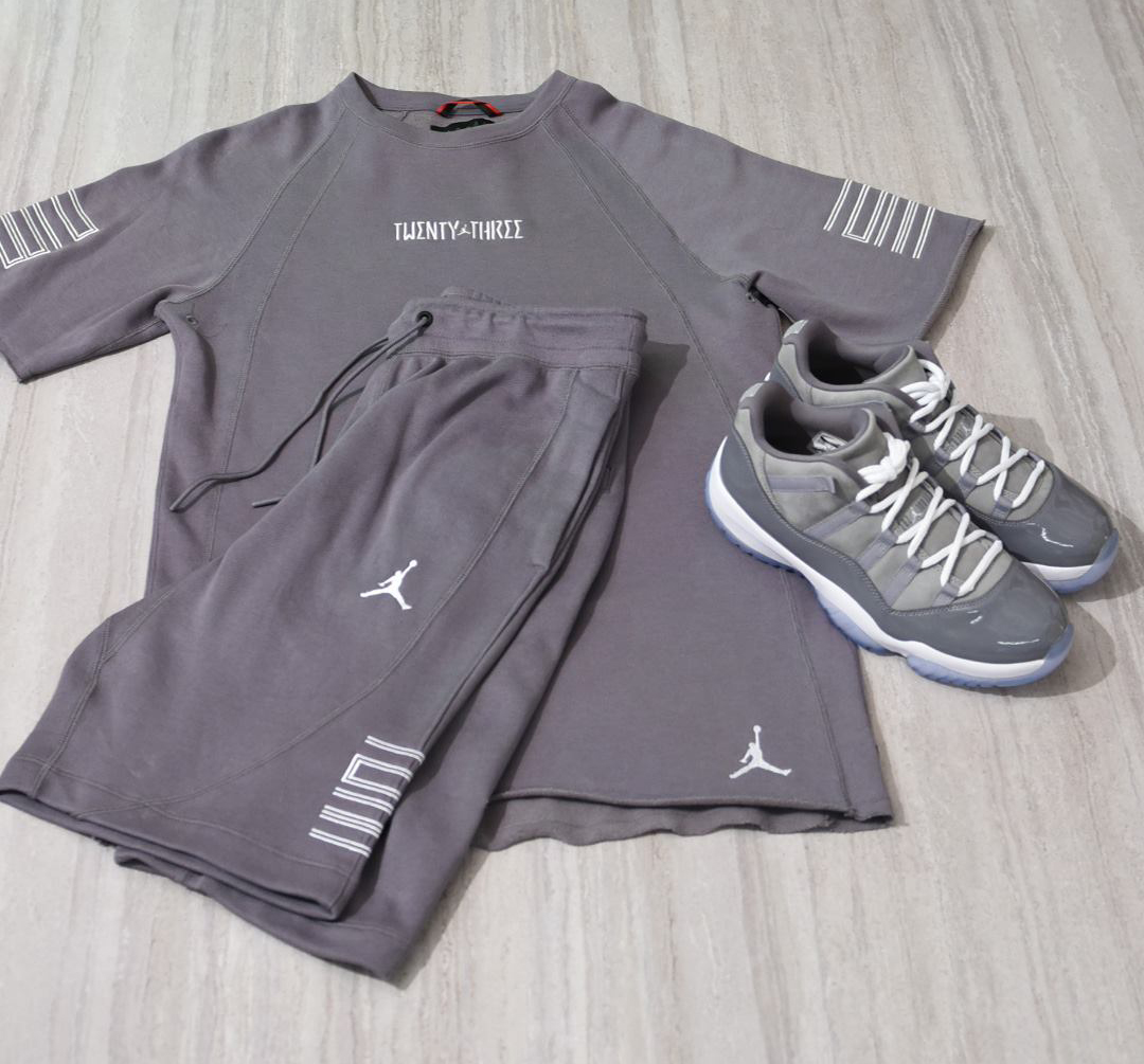 blue and grey jordan shirt