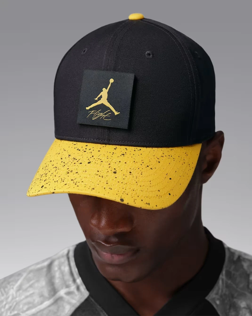 Black and Tour Yellow Jordan AJ4 Rise cap with speckled yellow brim