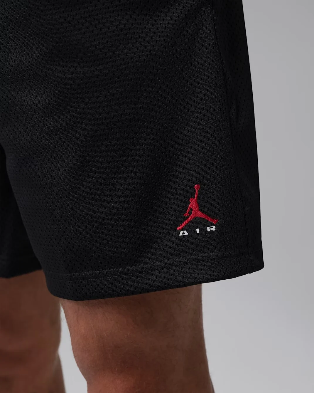 Jordan Brooklyn Championship Mesh Shorts in Black and University Red detail