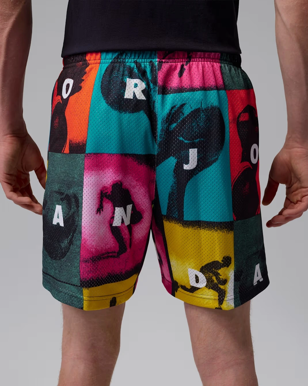 Back view of Jordan Brooklyn Mesh Shorts featuring a colorful comic-inspired all-over print.