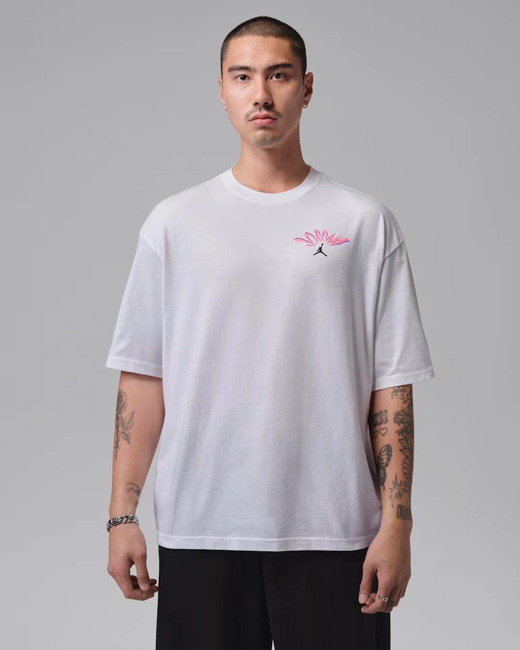 Front view of the Jordan Flight T-Shirt in white with minimalist Jordan branding on the chest.