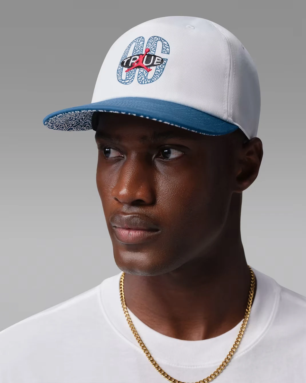 Jordan Pro adjustable hat in White and True Blue featuring True branding