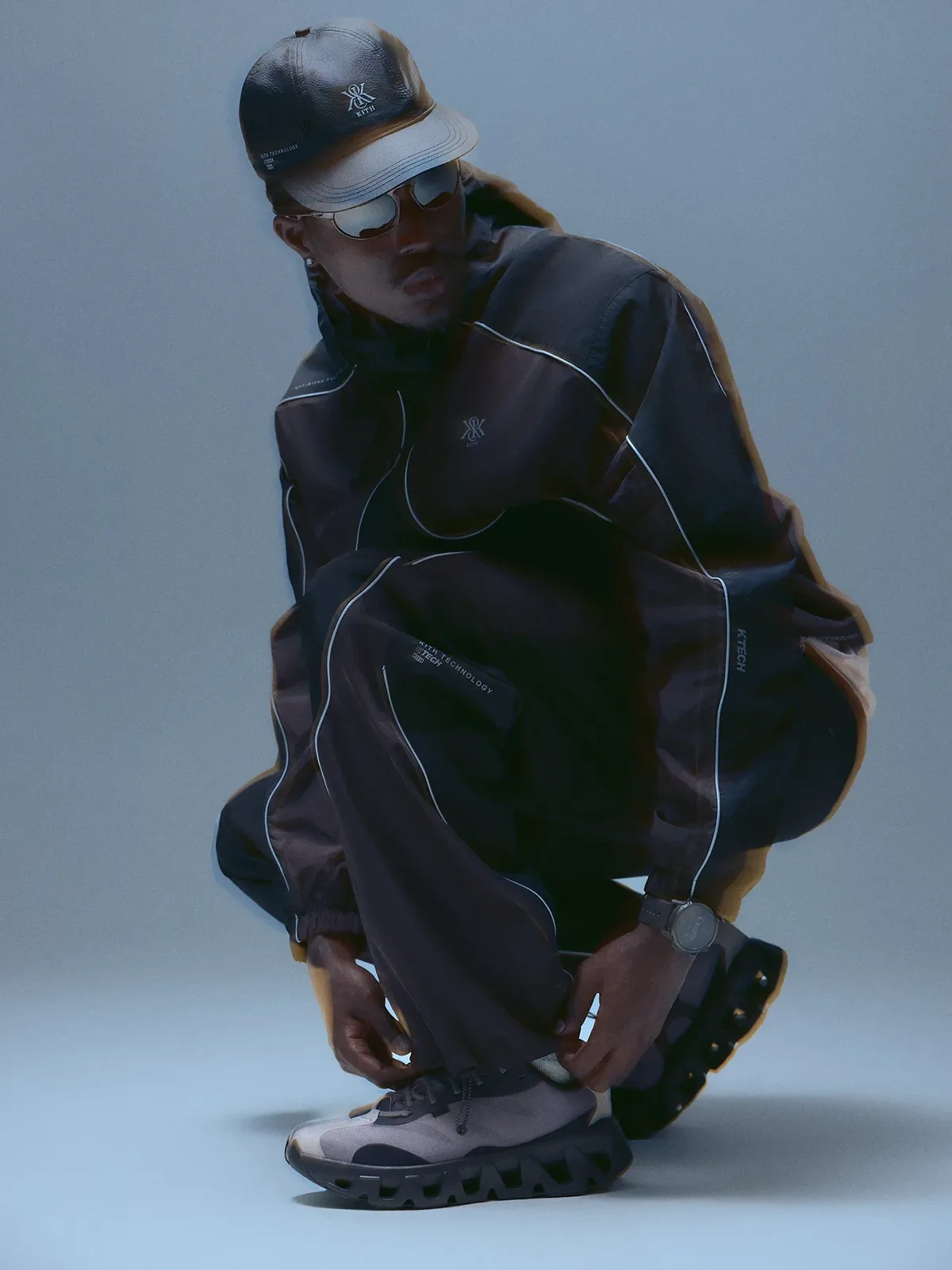 Kith K-Tech Fall 2026 black and grey sportswear with On footwear