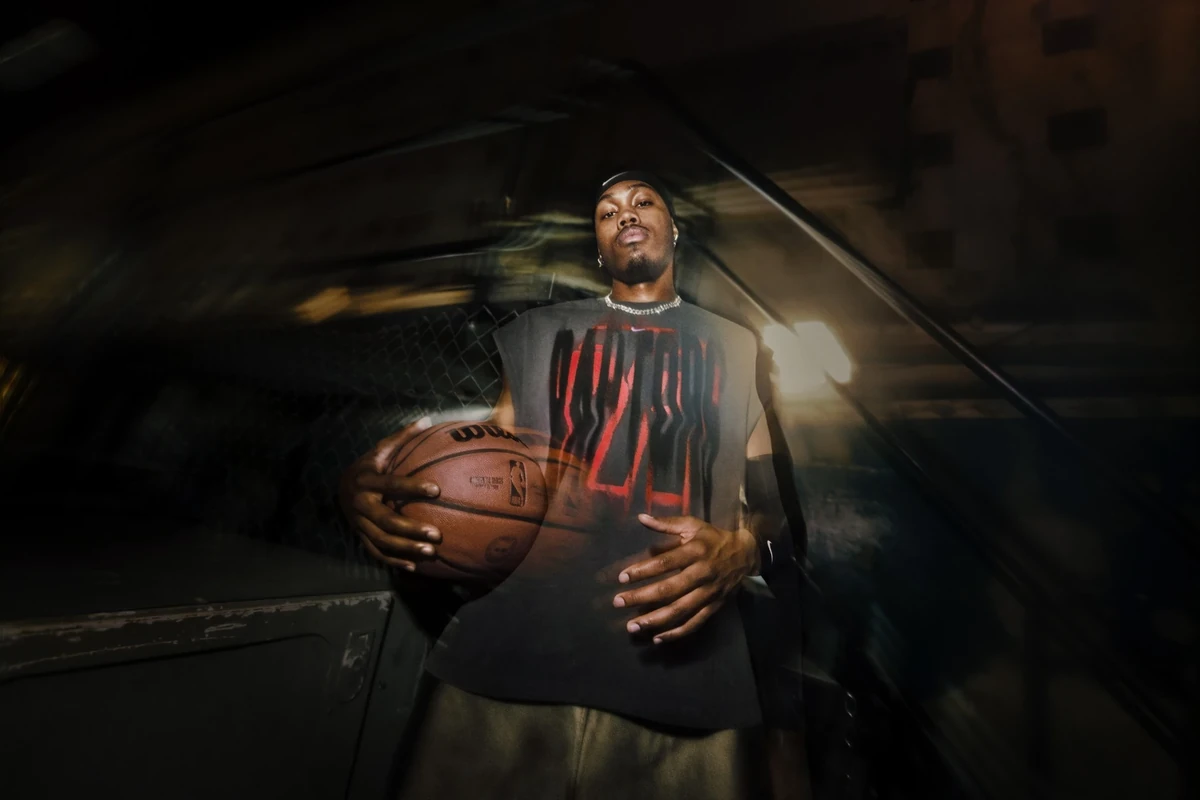 Scottie Barnes wearing black and red Nike NBA Standard Issue basketball apparel