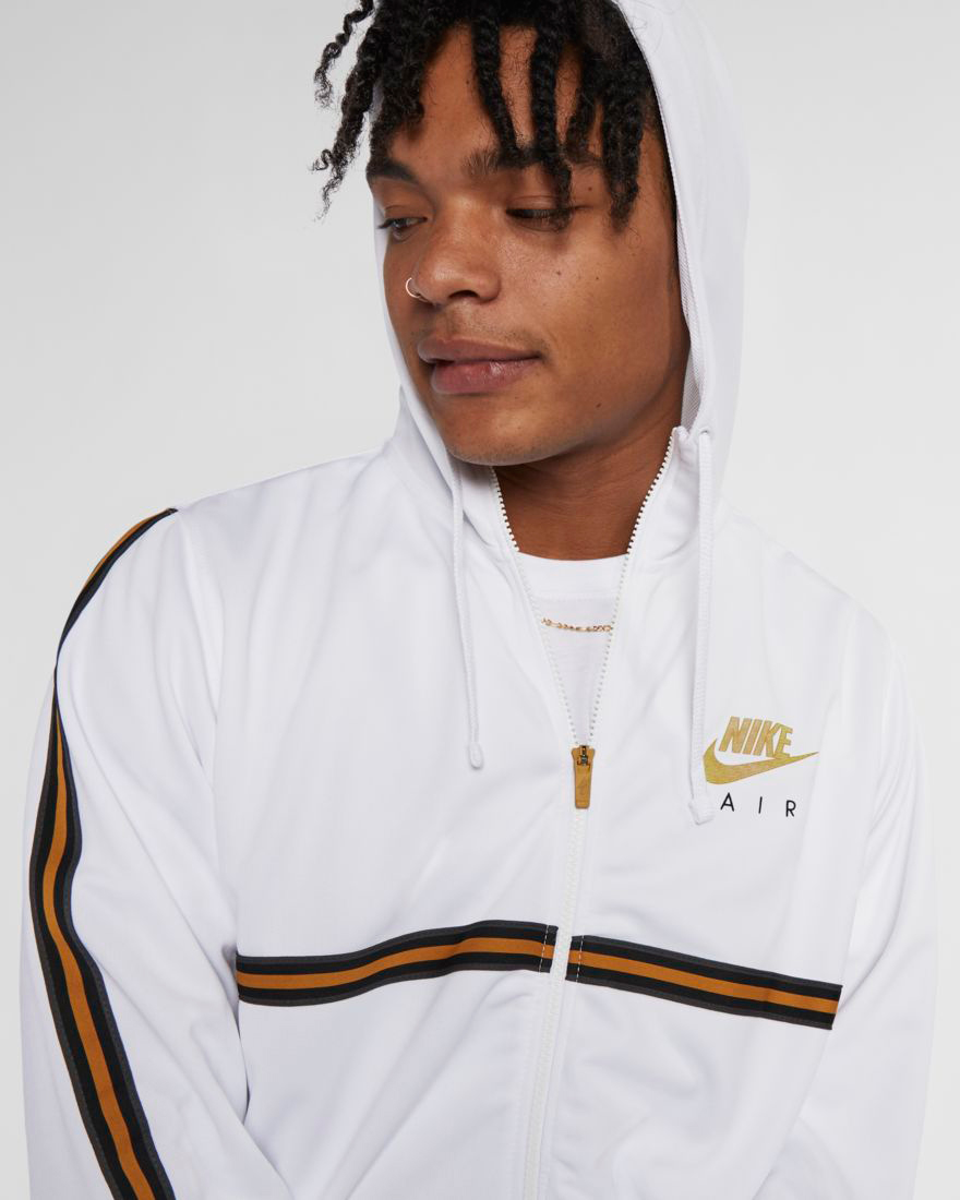 white and gold nike sweater