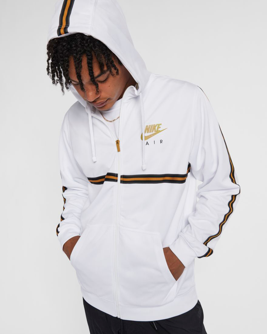 white nike hoodie with gold logo