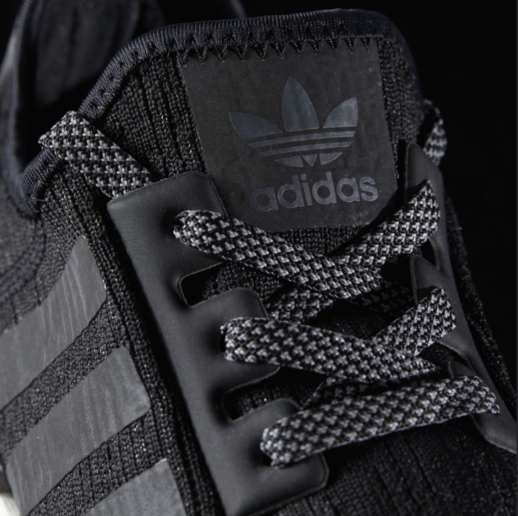 adidas nmd reflective black