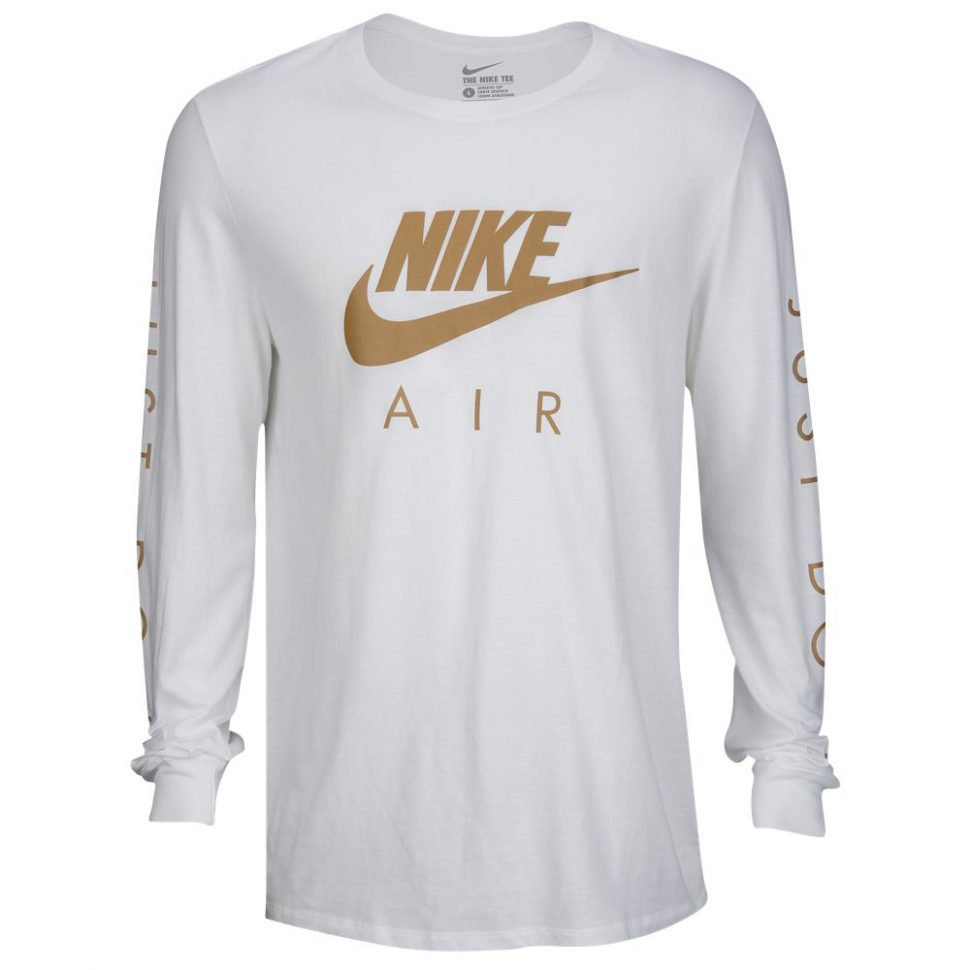 white & gold nike shirt