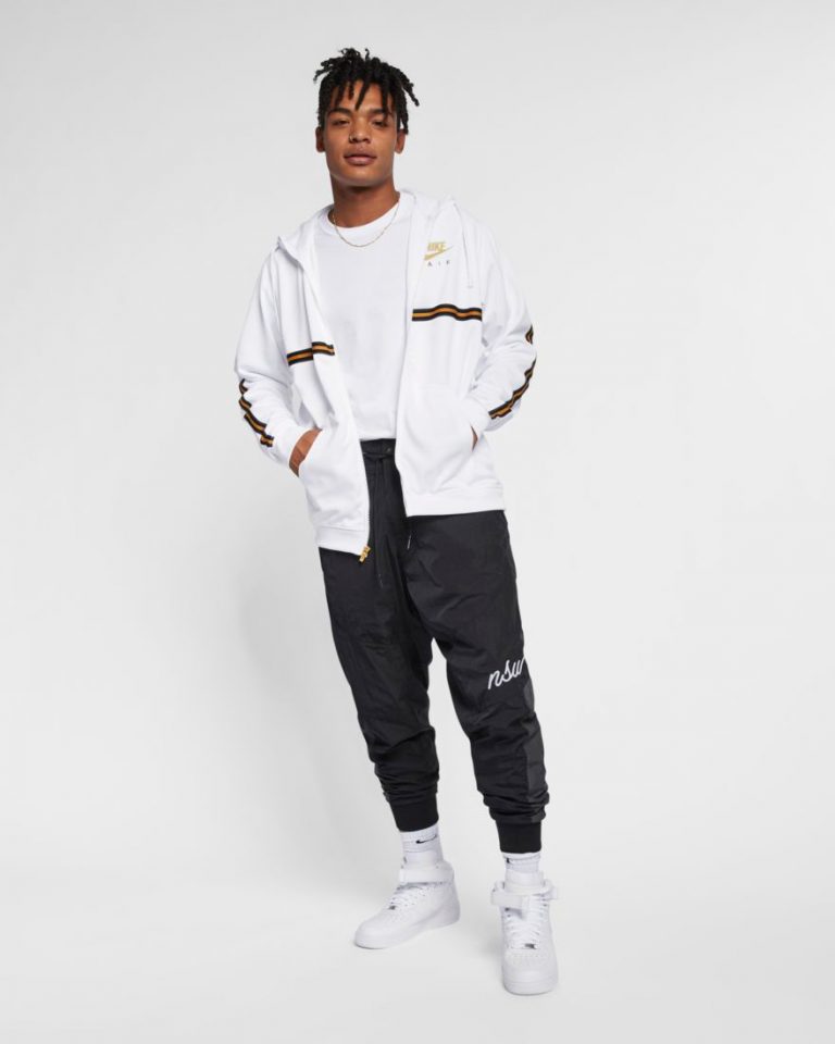 nike black and gold pants